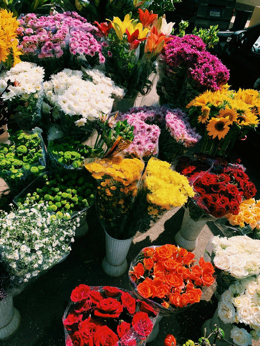 a bunch of flowers that are on a table